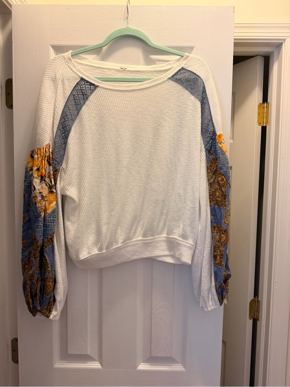 Free People White Knit Pullover with Blue & Yellow Patchwork Sleeves